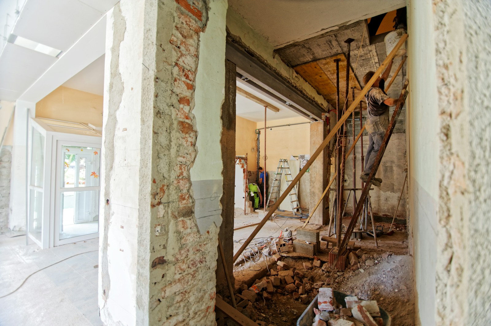 Contractors rebuilding the interior of a residential property